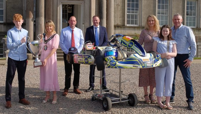 Lord Mayor, Alderman Margaret Tinsley welcomes Daniel Kilpatrick and his family to the Palace, Armagh to celebrate his recent British Ultimate Karting Championship win.