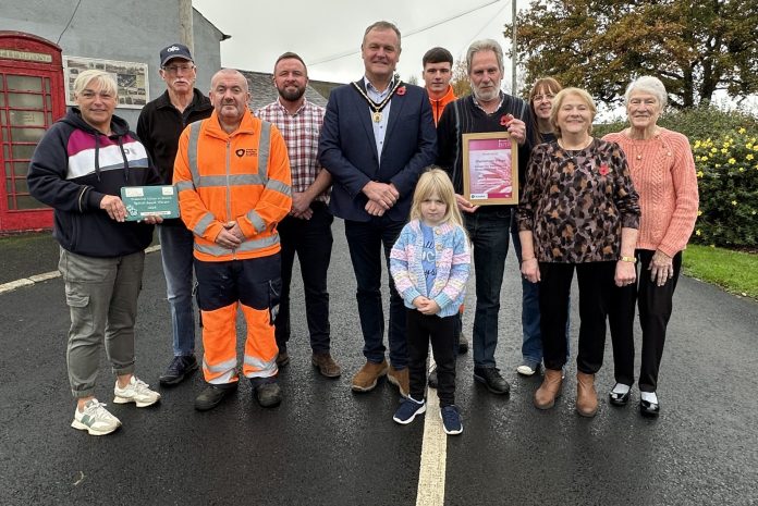 Pictured in the award-winning small village of Charlestown are Niall McShane (ABC Council), Leanne McShane (ABC Council), Deputy Lord Mayor of ABC Borough, Cllr Kyle Savage, Ruari Toman (ABC Council), Padraig Gowdey (ABC Council), with local residents Elsie Parks, Hazel Guiney, Ronnie Turkington, Robert Turkington, Diane Guiney and Amy Guiney.