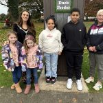 Lord Mayor of ABC Borough, Cllr Sarah Duffy with her daughters Emily and Lucia at the duck feeder in Lurgan Park, with Leanne McShane, Outdoor Spaces Development Officer ABC Council and visitors to the park.