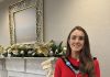 Female standing with festive background