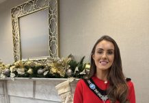 Female standing with festive background