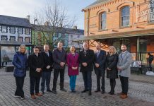 A line of people standing outside Dromore Town Hall