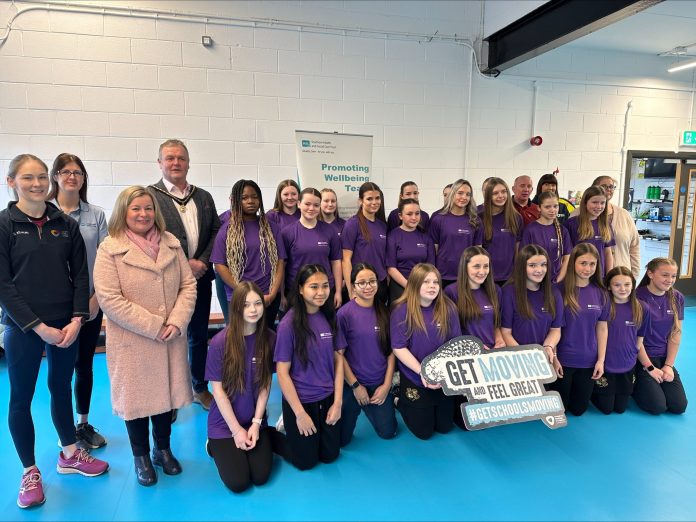 Teenage girls from local schools pictured with ABC council staff and Southern Health and Social Care Trust staff at the This Girl Moves Leadership day at Dromore Community Centre.