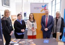 People standing together at a job fair in The Market Place Theatre Armagh.