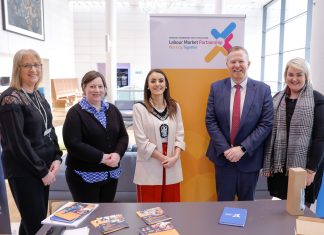 People standing together at a job fair in The Market Place Theatre Armagh.